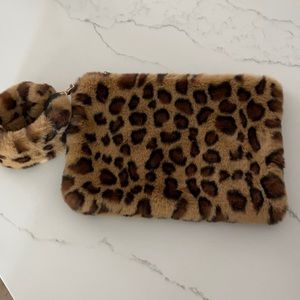 Faux fur leopard print wristlet